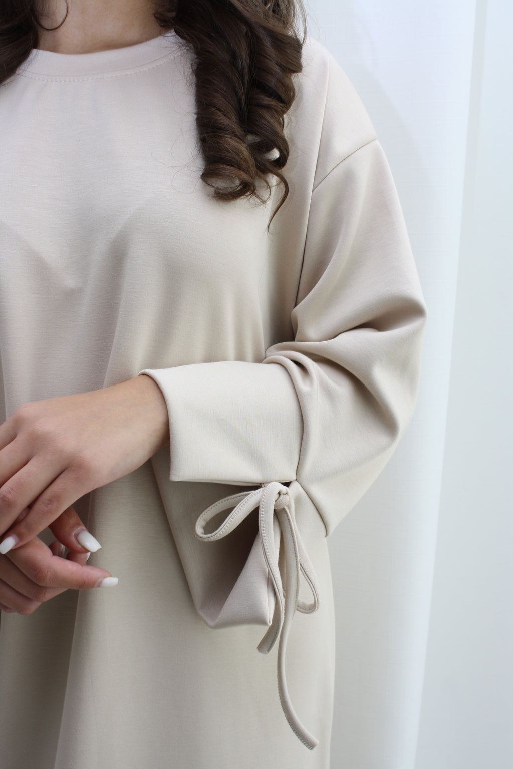 Sweater met cute strik- beige